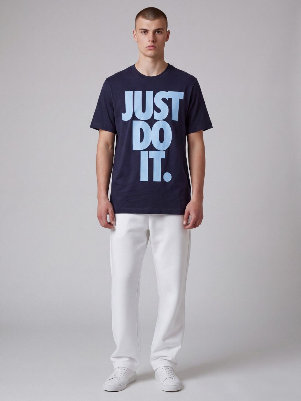 Nike Men's Black T-Shirt with Light Blue "JUST DO IT." Graphic